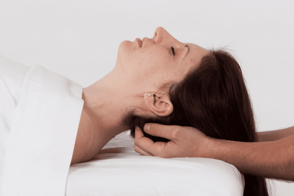 Cranial Sacral Therapy Suboccipital release having the client's head relax back into the therapist's finger tips